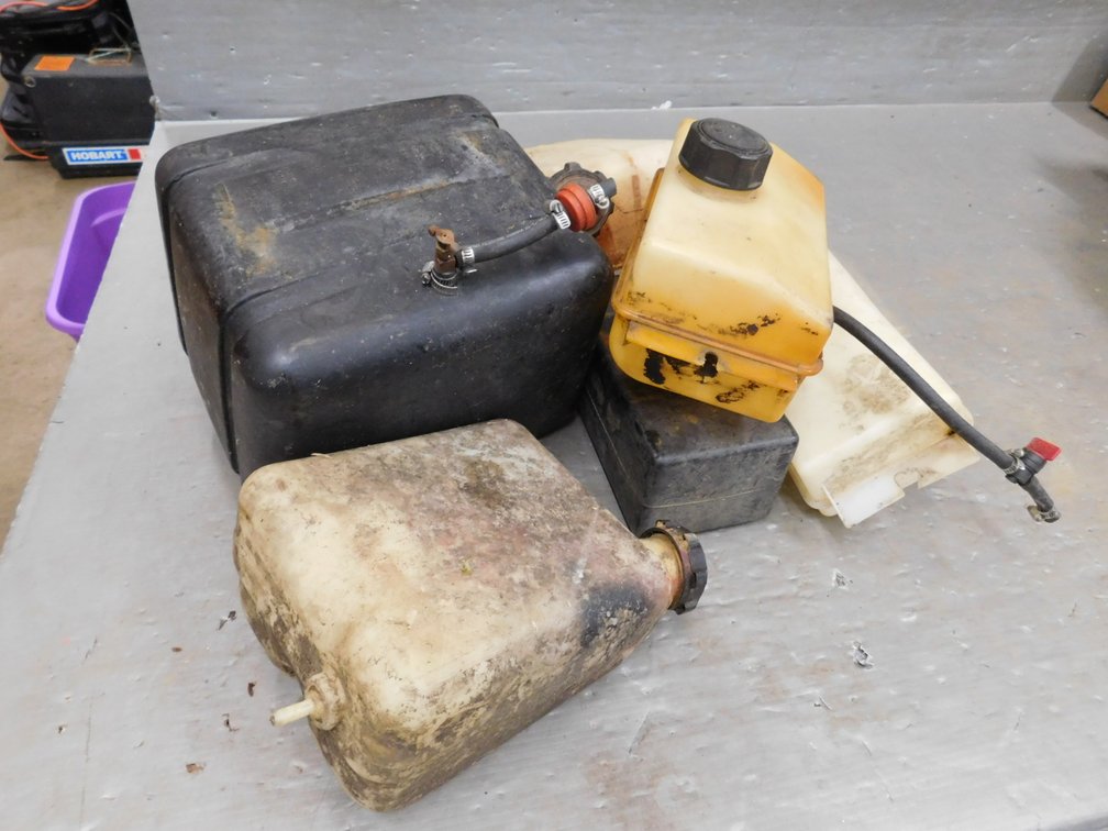 Assorted Gas Tanks in Purple Tote