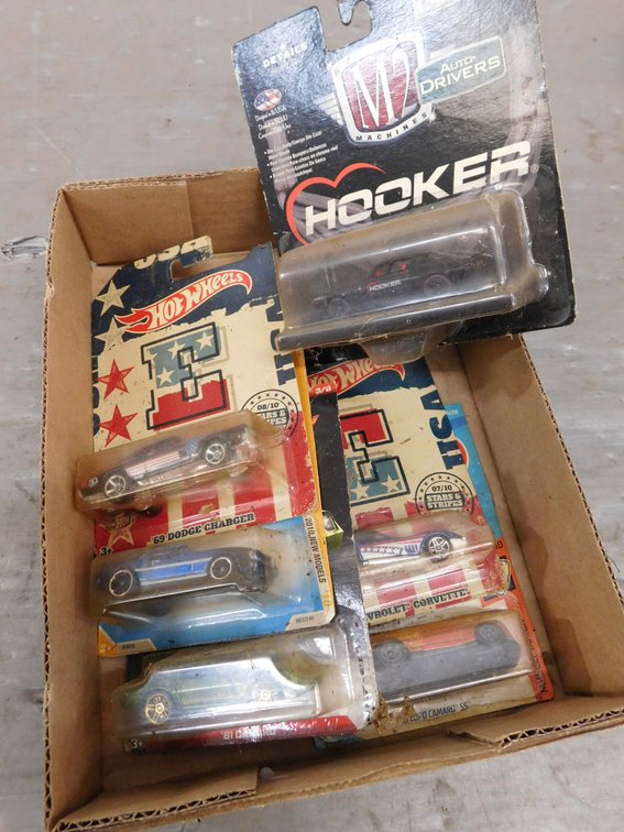 Six Assorted Die Cast Cars in sealed Packages