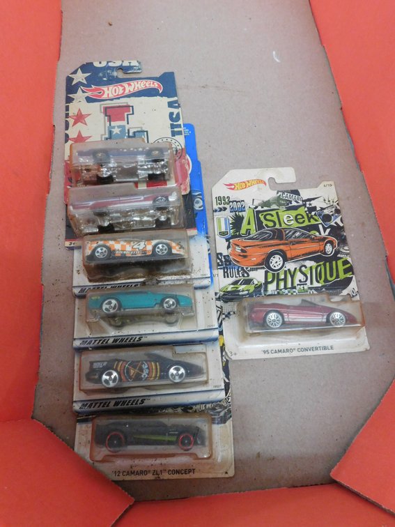 Seven Assorted Hot Wheels Die Cast Cars, IN Sealed Packages