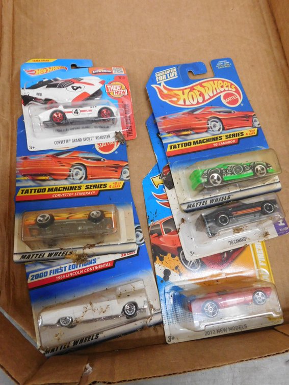 Six Assorted Hot Wheels Die cast Cars in Sealed Packages