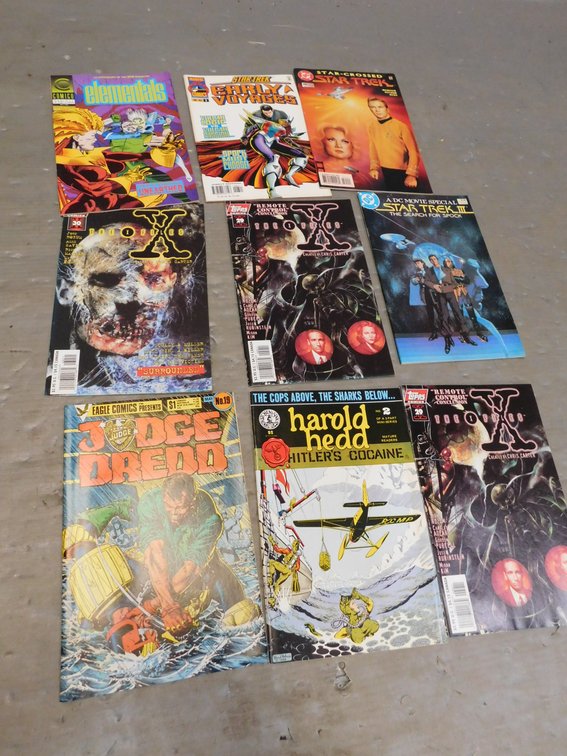 Nine Assorted Comic Books
