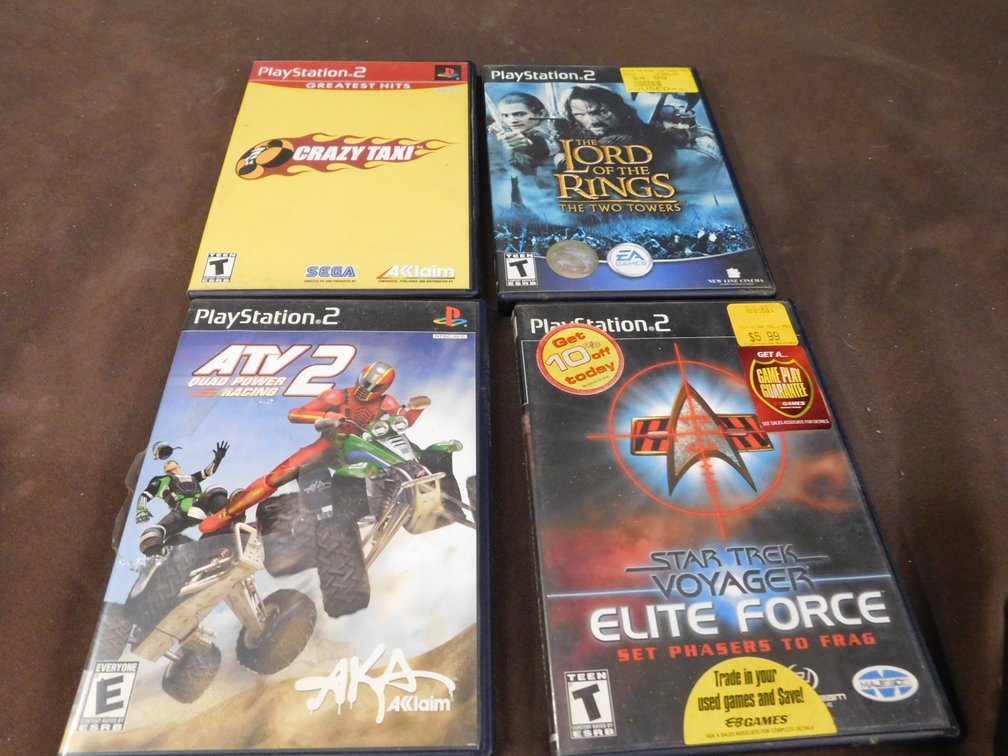 Four PlayStation 2 Games, ATV Quad Power Racing 2, Crazy Taxi, Star Trek Voyager Elite Force, Lord of Rings