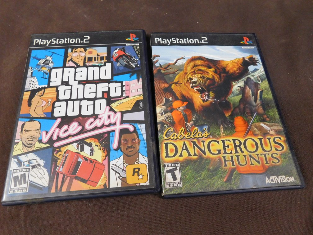 Two PlayStation 2 Video Games, Grand Theft Auto Vice City, Cabela's Dangerous Hunts