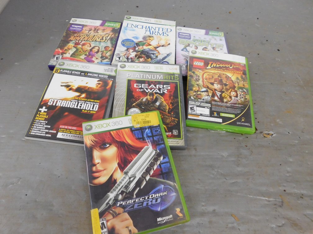 Six XBOX 360 Games, Perfect Dark, Gears of War, Kinect Adventures, Lego Indiana Jones, Kinect Sports, Enchanted Arms