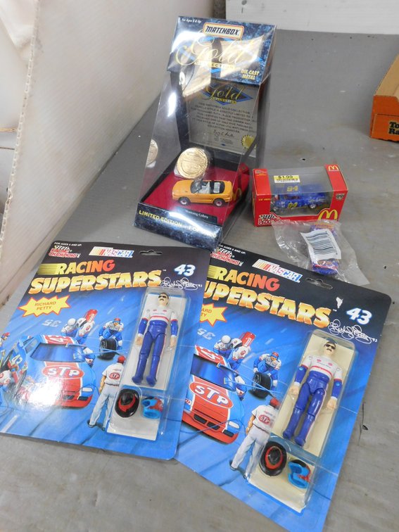 Two Richard Petty Action Figures, New in package, Matchbox Die Cast Metal Car, New in Package, Pop Secret Car, McDonald's Racing Truck