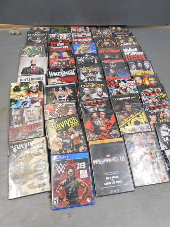 Large Lot of Wrestling DVDs in Black Plastic Milk Crate