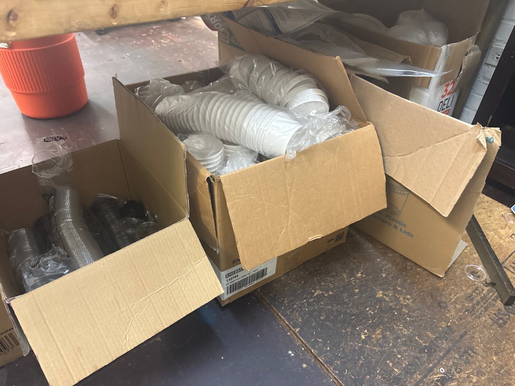 Assortment of Bowls and togo items open boxes
