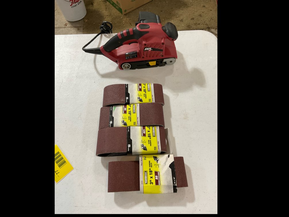 Belt sander with extra belts