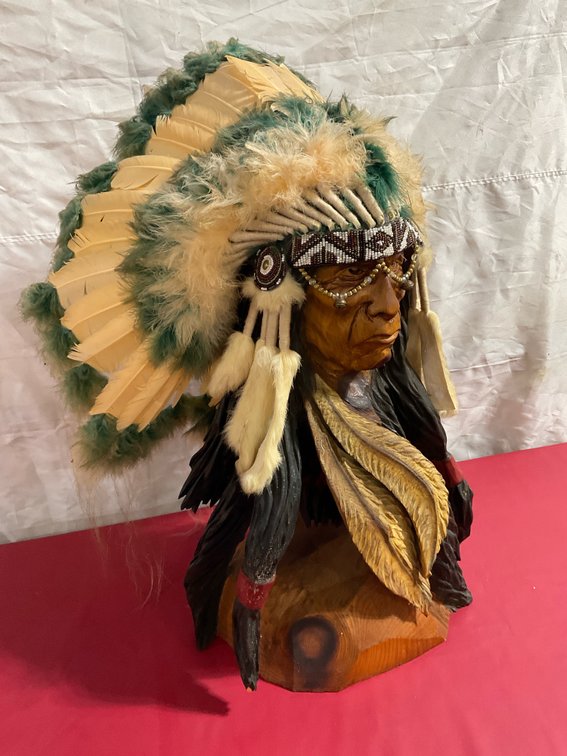Native American carved bust with headdress