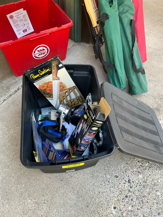 Tote full of miscellaneous kitchenwares