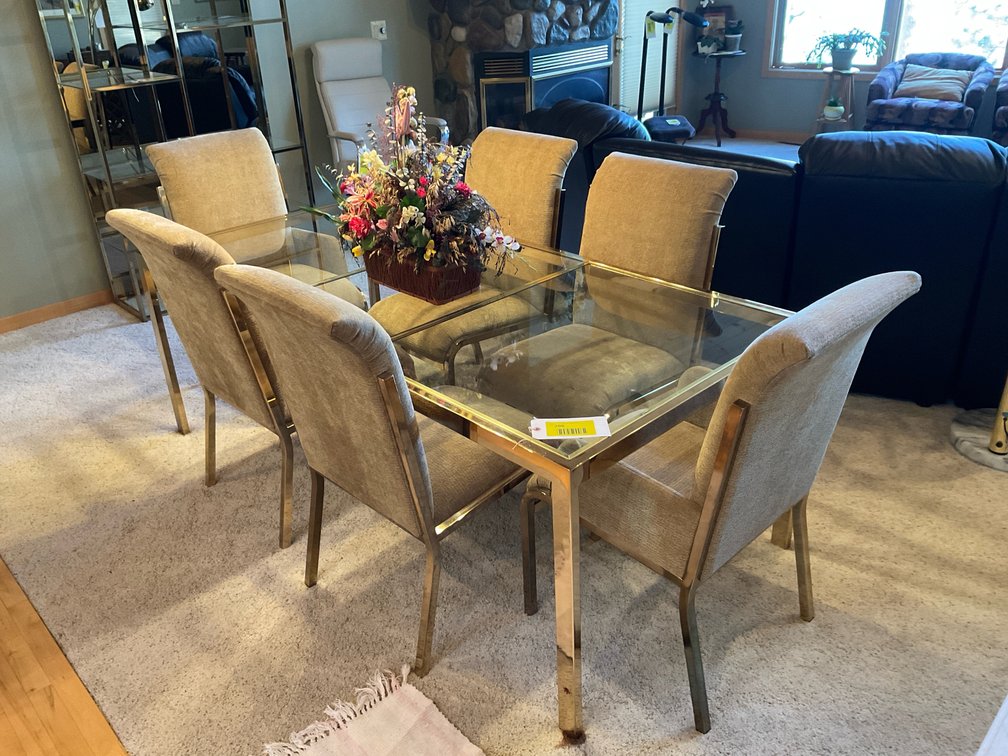Beautiful glass top table with six chairs