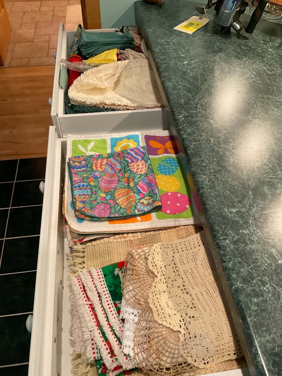 Two drawers of miscellaneous place settings