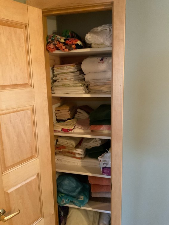Closet with towels and sheets