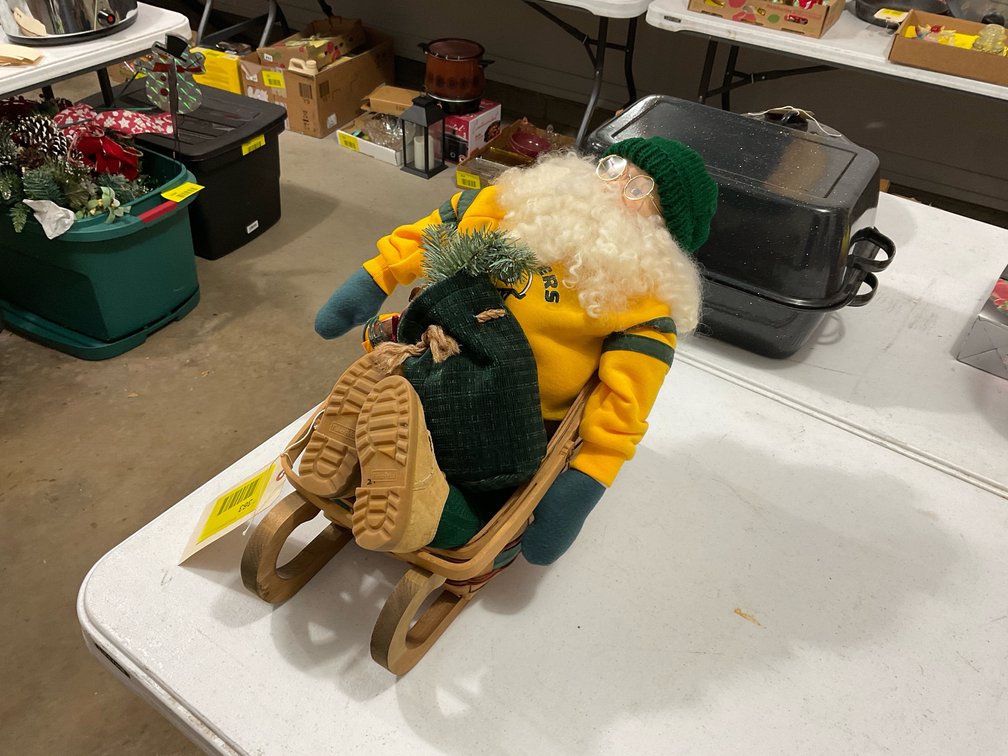 Packer Santa in sleigh