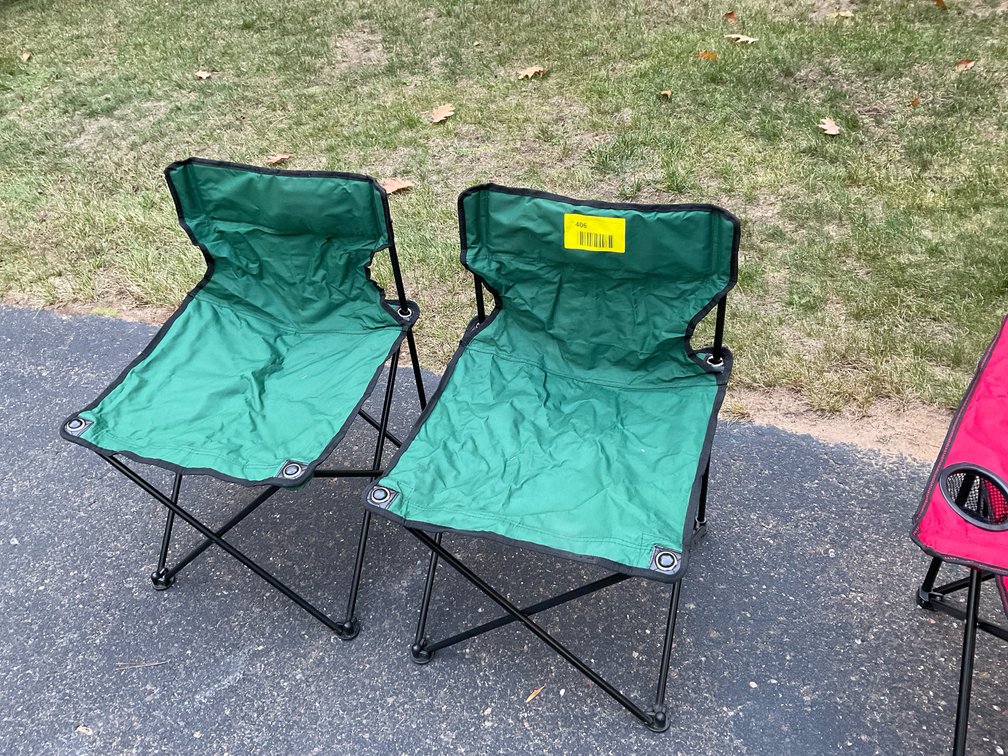 (2) green folding chairs