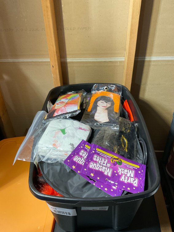 Tote full of party mask wigs