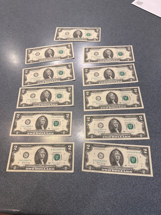 (11) $2 dollar bills