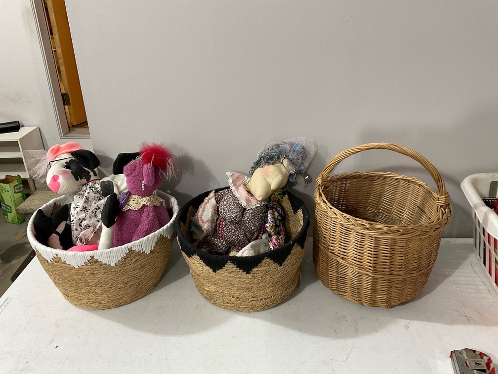 Wicker style baskets with dolls