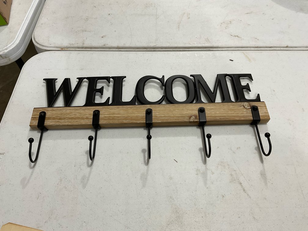 Welcome coat hanger