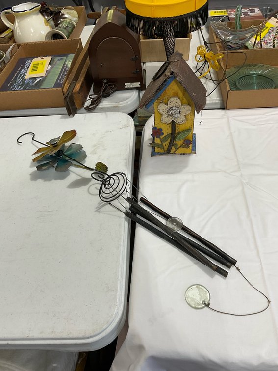 Wind chimes and birdhouse