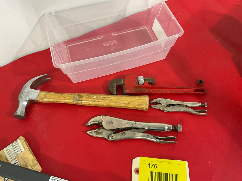 Vise grips, hammer, pipe wrench