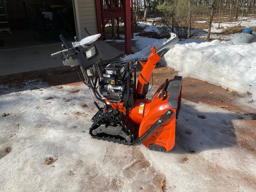 Like new Husqvarna snowblower, heavy duty with tracks