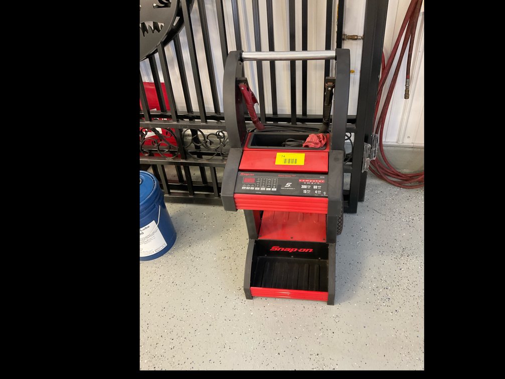Snap-on battery charger