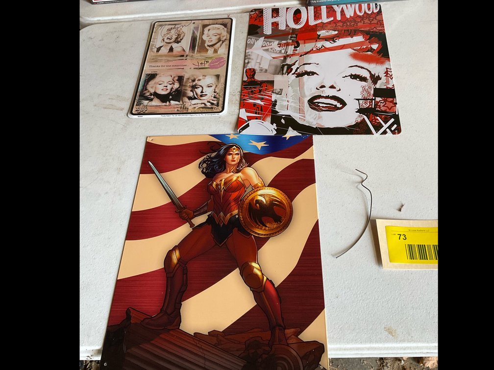 Marilyn Monroe/Wonder Woman metal signs