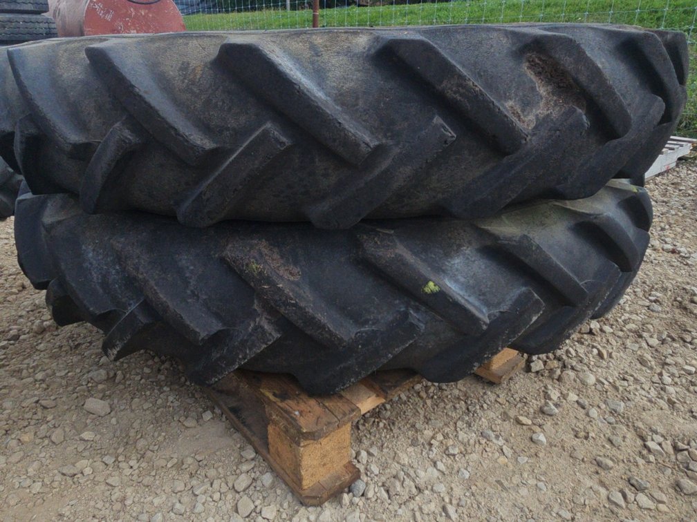 PAIR OF 9.5 - 42 TIRES ON JOHN DEERE RIMS