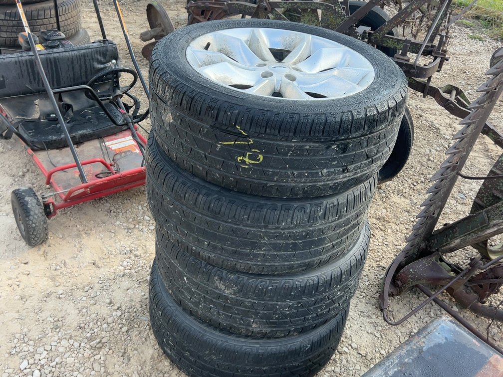 (4) 255/50R20 TIRES ON 5 BOLT FORD ALUMINUM RIMS