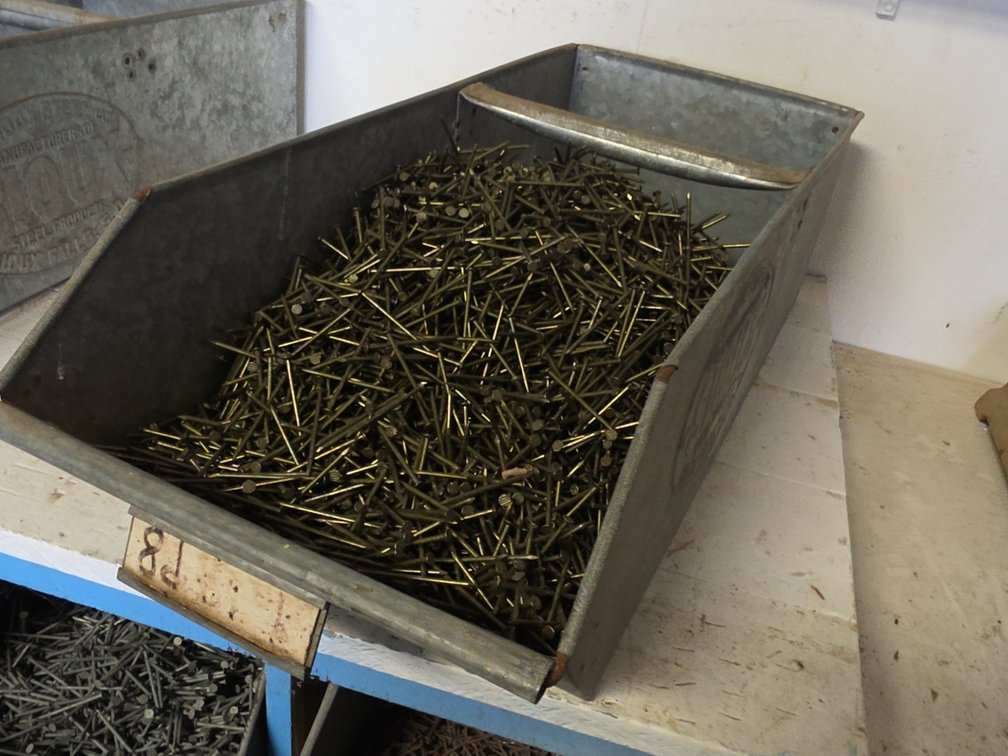 8D 2-3/8" NAILS IN SIOUX STEEL BIN