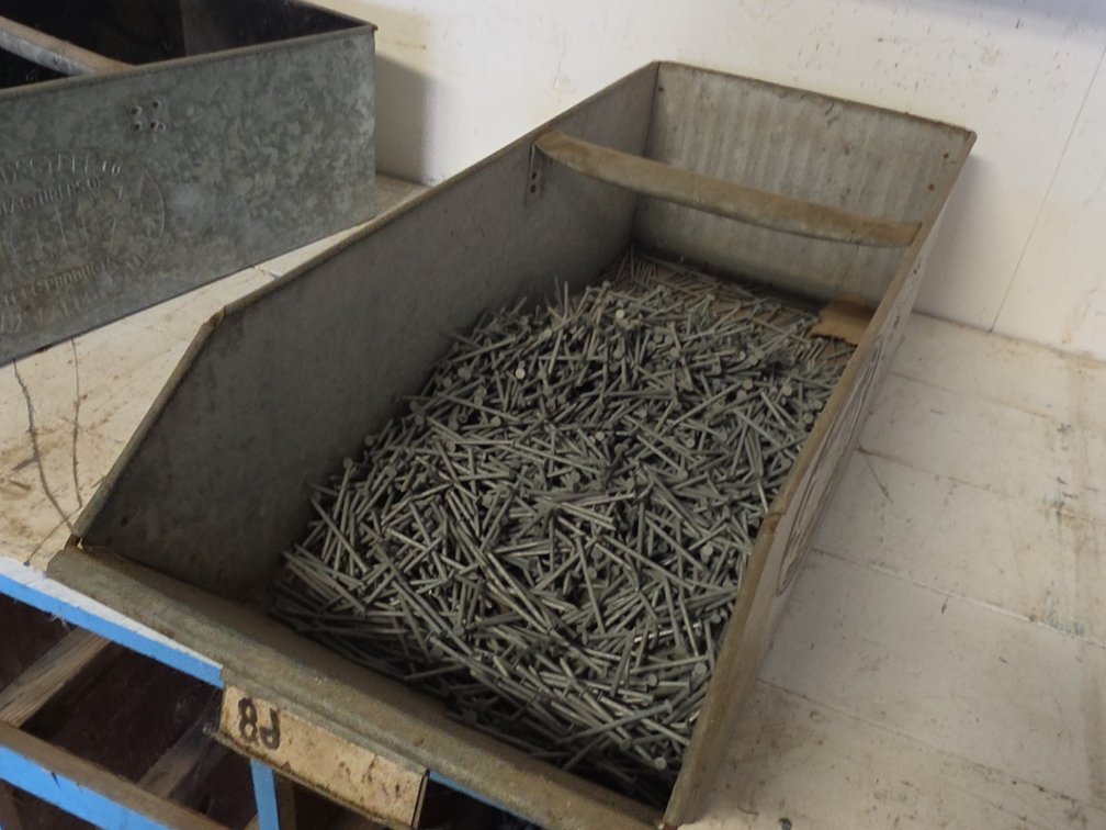 8D 2-1/2" NAILS IN SIOUX STEEL BIN