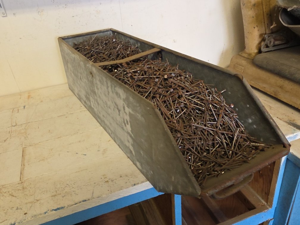 7D BOX 2-1/4" NAILS IN STEEL BIN