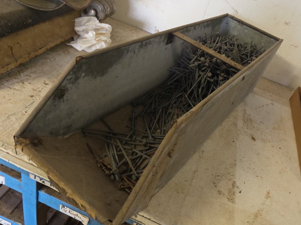 8D 4" FLOORING NAILS IN STEEL BIN