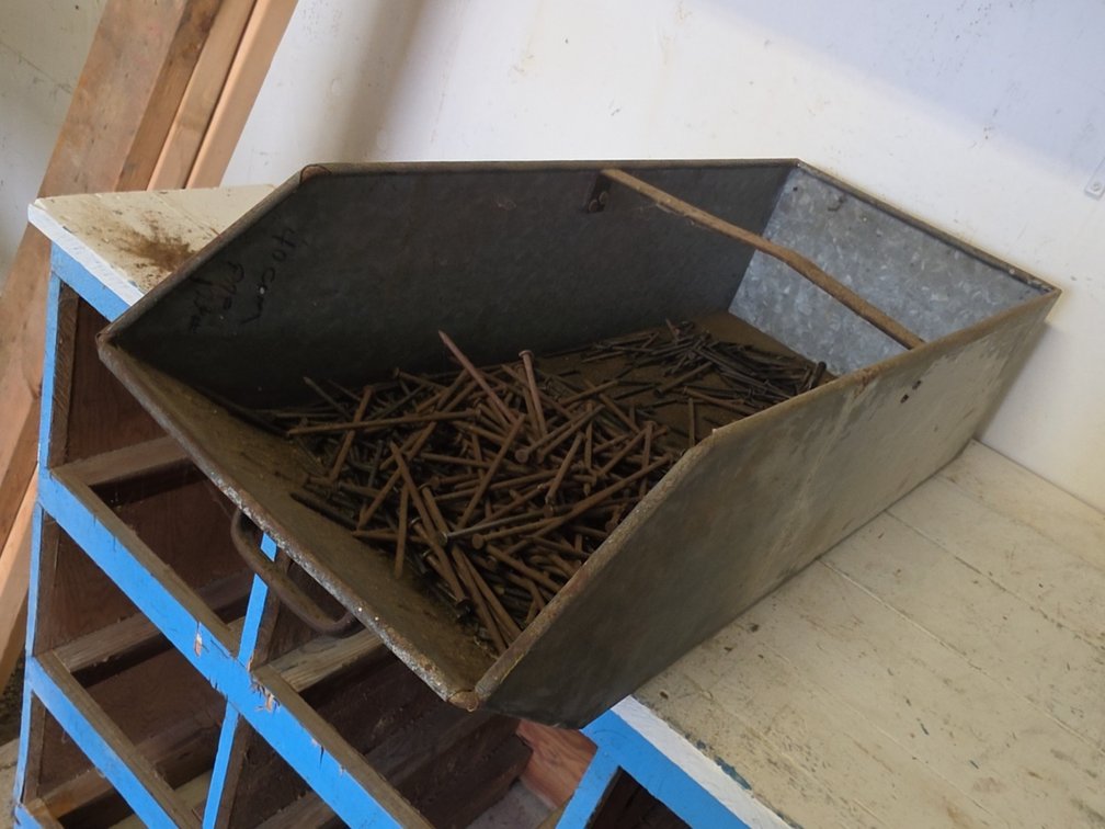 ASSORTED NAILS IN STEEL BIN