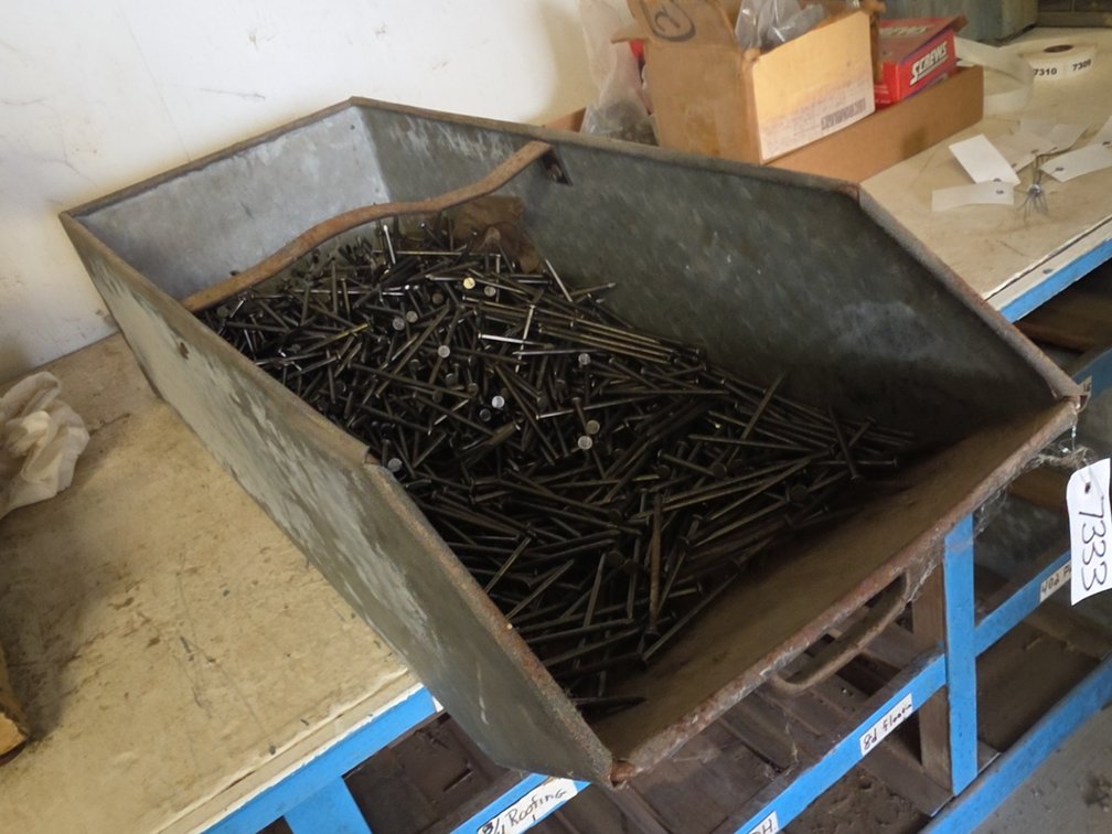 40D 4" POLEBARN NAILS IN STEEL BIN