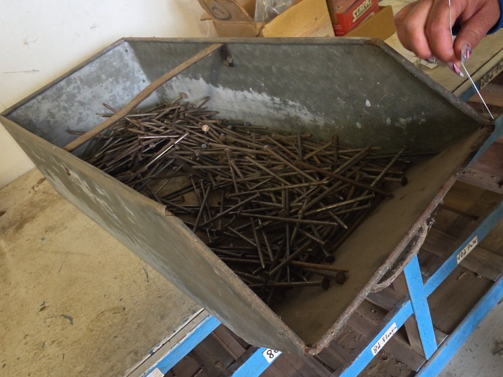 60D 6" POLE BARN NAILS IN STEEL BIN