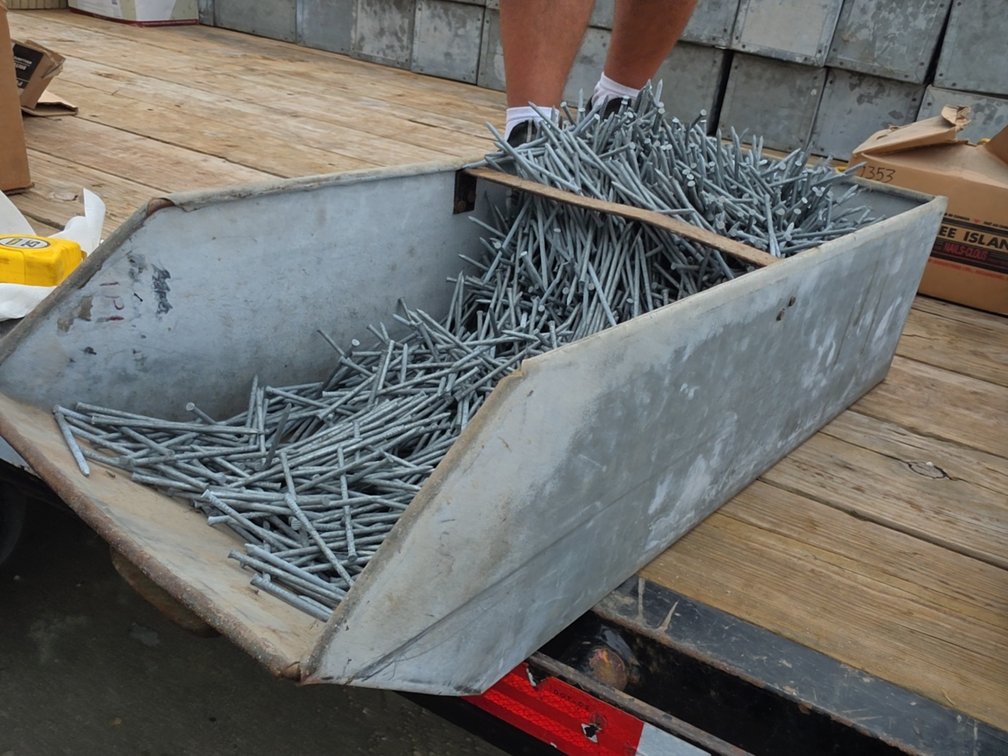 4" GALVANIZED CASING NAILS IN STEEL BIN