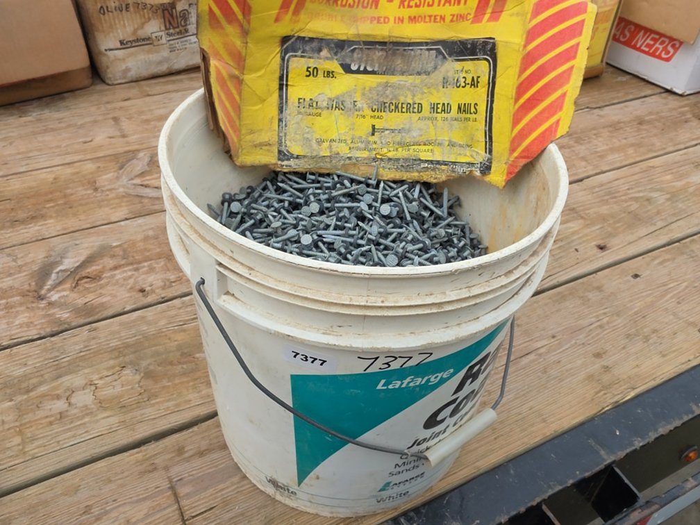 1-1/2" TIN NAILS IN PAIL
