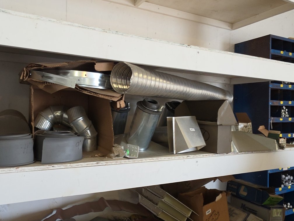 SHELF OF ASSORTED DUCTWORK