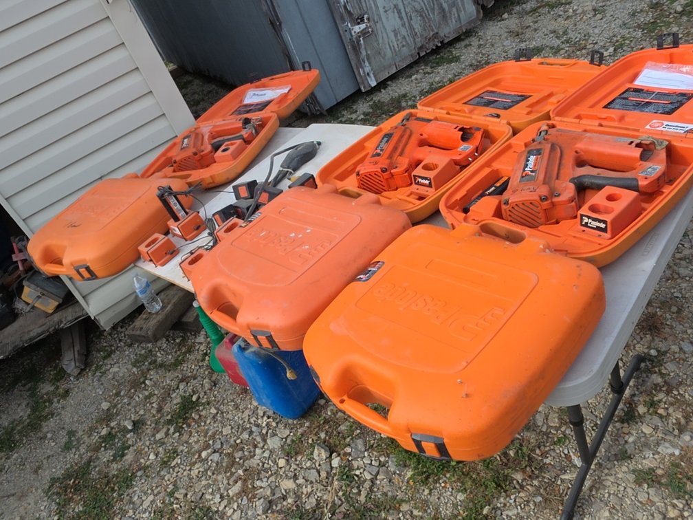 (6) PASLODE NAIL GUNS & CHARGING BOARD