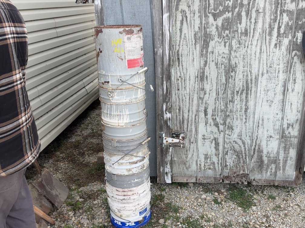 STACK OF 5 GALLON PAILS