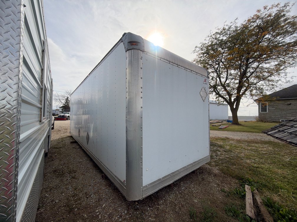 102”X26' TRUCK BOX WITH A ROLL UP DOOR
