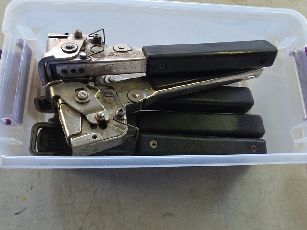 TUB OF HAND STAPLERS