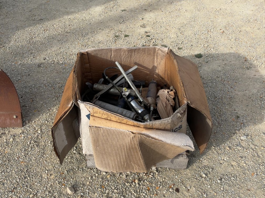 BOX OF GREASE GUNS