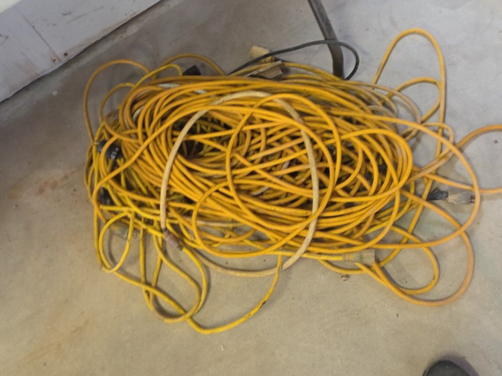 LOT OF EXTENSION CORDS AND LIGHT