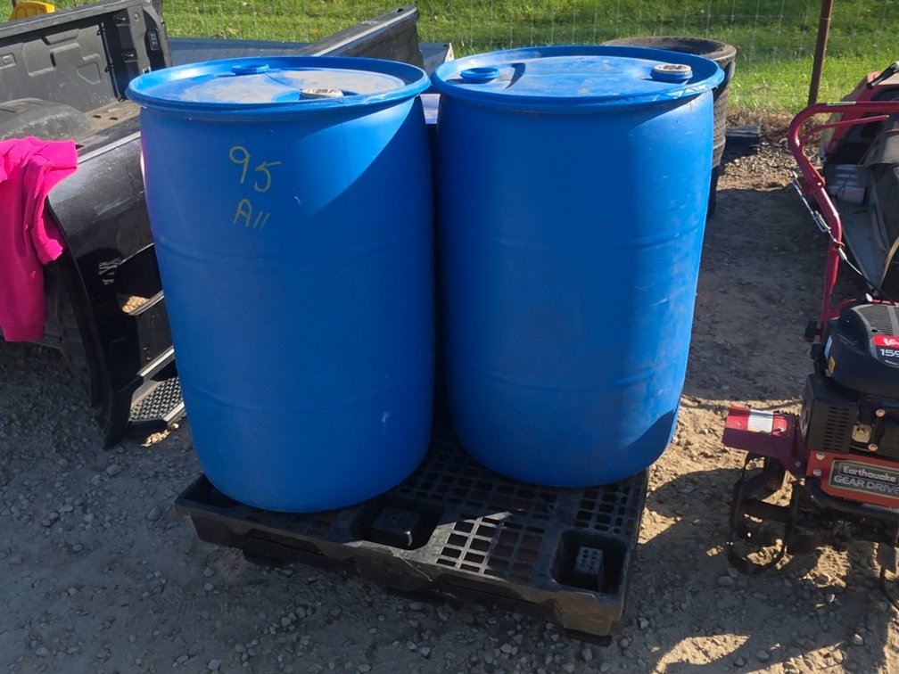 (3) PLASTIC BARRELS W/ (3) PLASTIC PALLETS