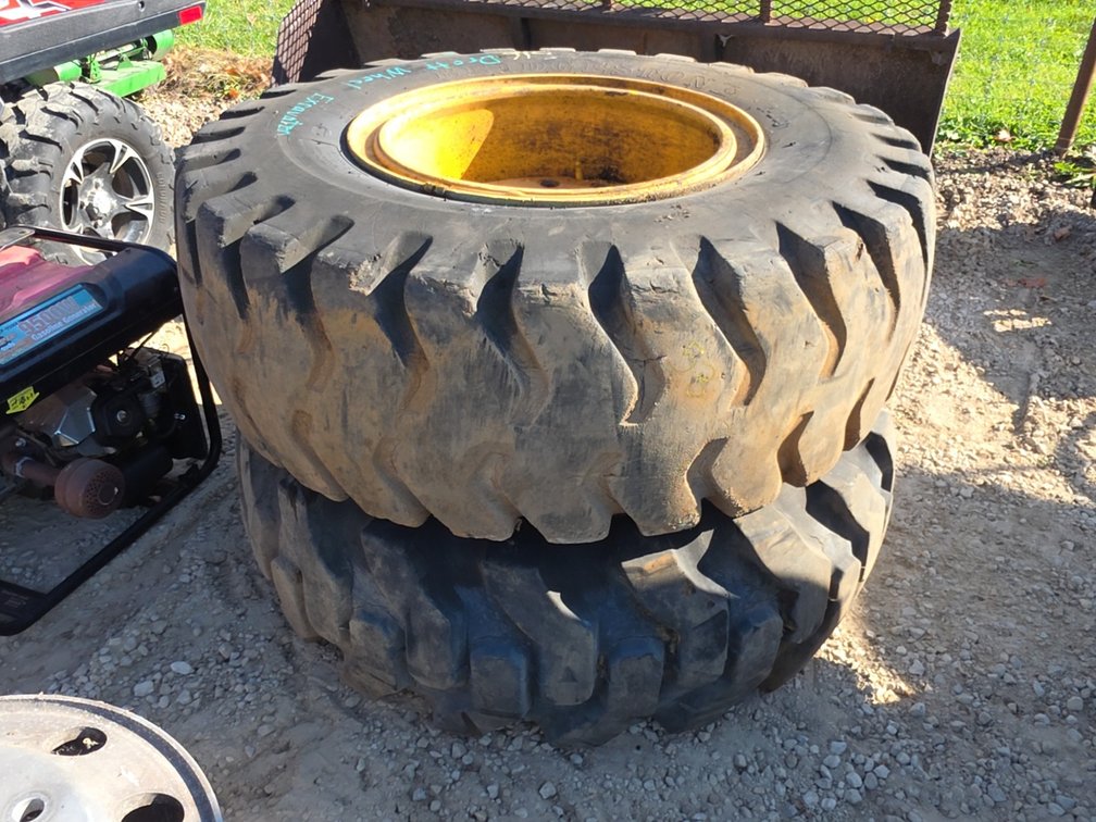 PAIR 17.5 - 25 TIRES ON 12 BOLT RIMS