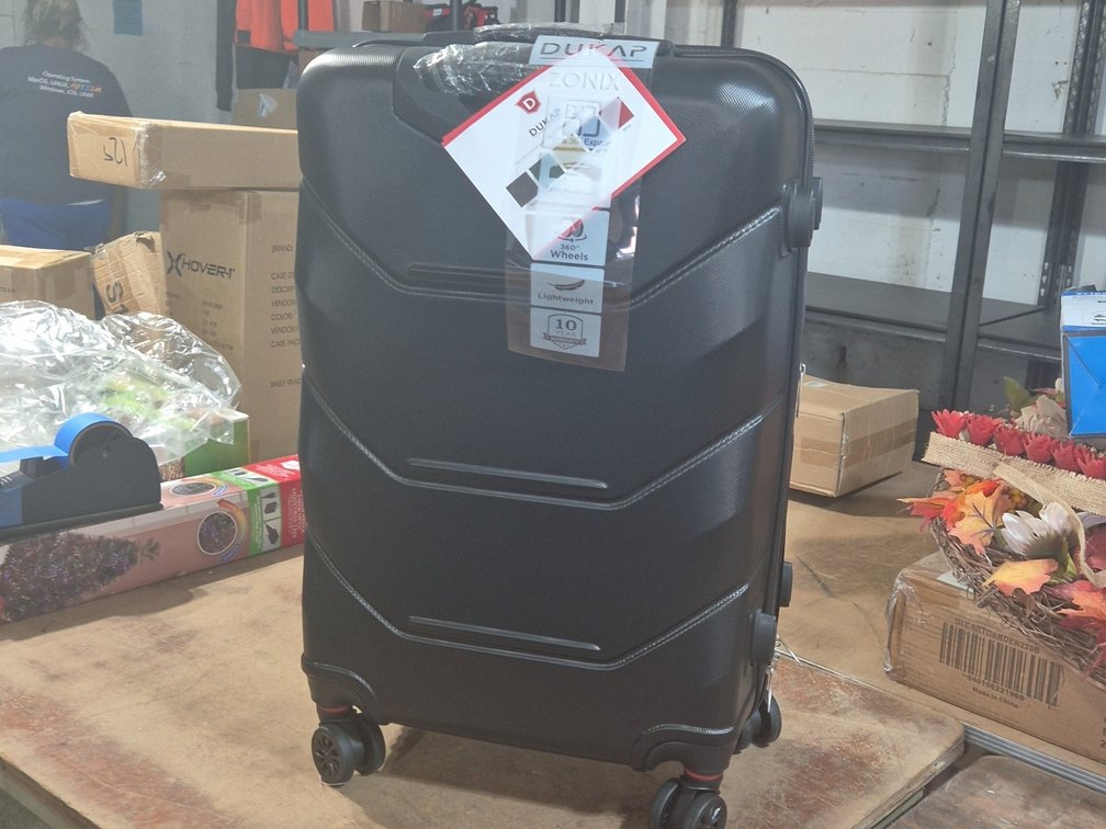NEW SUITCASE