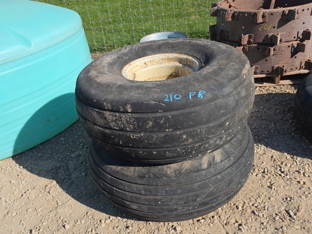 (2) 16.5L-16.1SL TIRES ON 8 BOLT RIMS